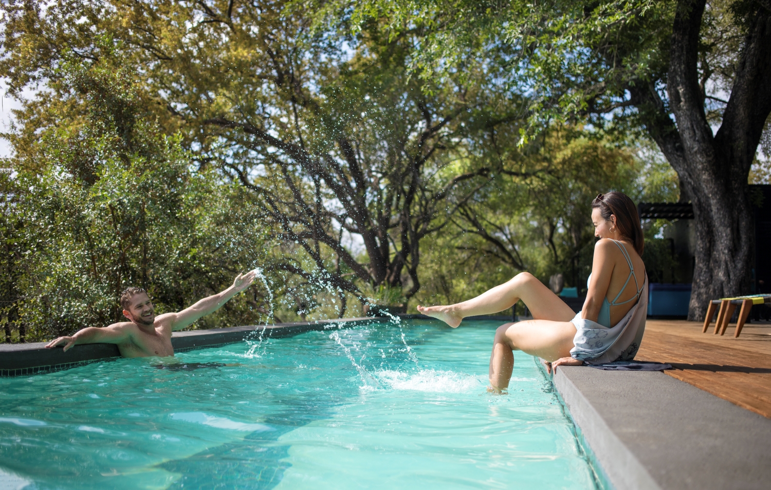 2-couple-spending-quality-time-at-the-main-pool.jpg