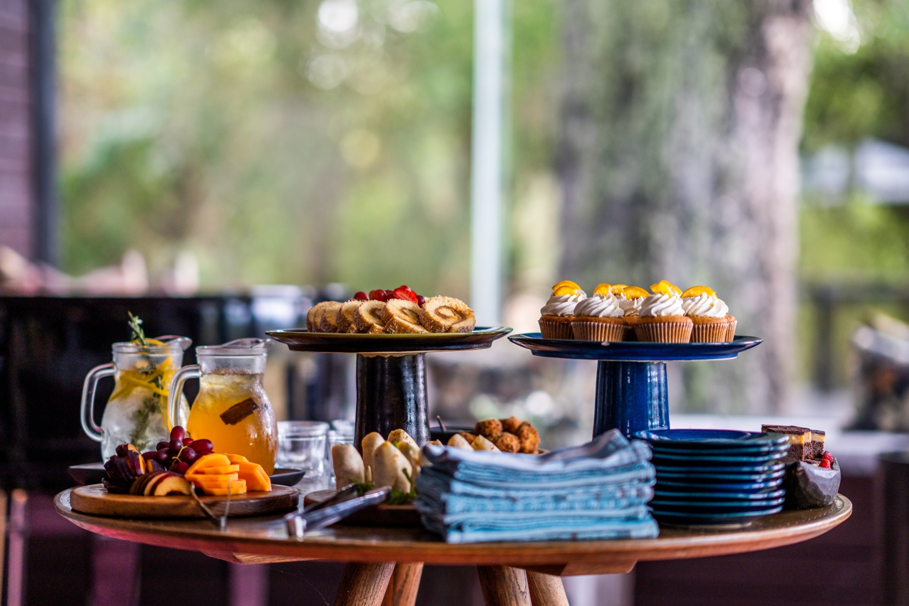 a-colourful-spread-of-savoury-snacks-cupcakes-fruit-and-refreshing-drinks.jpg