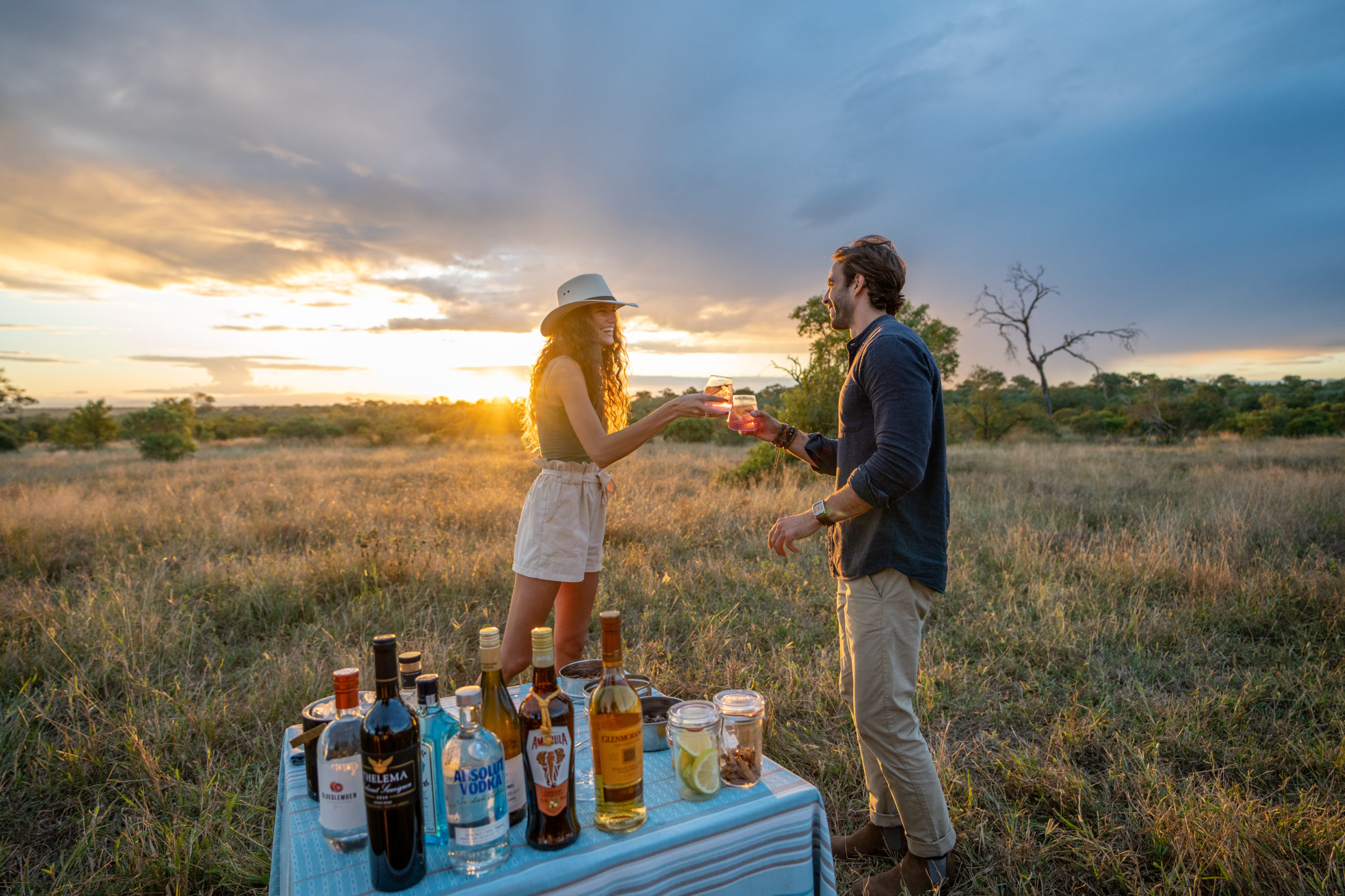 Safari guide and tracker in a safari vehicle